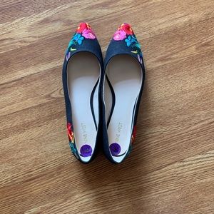 Embroidered black shoes